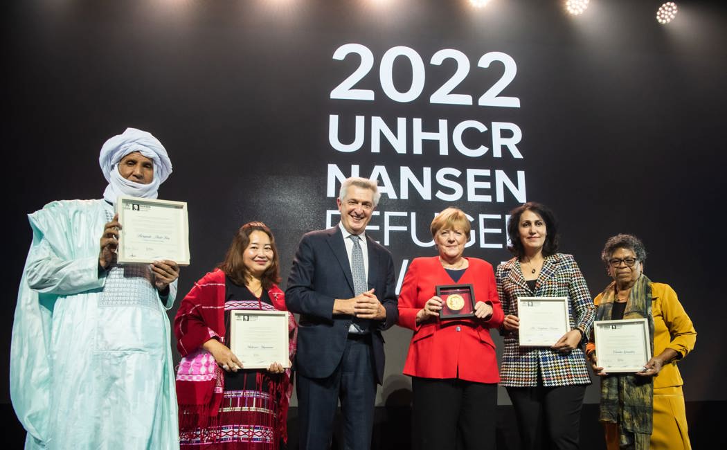 Former Federal Chancellor of Germany, Dr. Angela Merkel, who is the 2022 Nansen Refugee Award Global Laureate, along with UN High Commissioner for Refugees Filippo Grandi, poses for a photograph with this year’s Nansen Refugee Award Regional Winners.