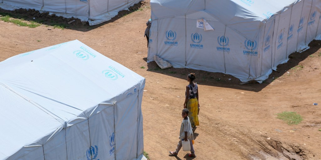 Families displaced by the ongoing conflict in the Tigray region find shelter in an IDP site called Five Angels in Shire where UNHCR has set up shelter to provide a roof to displaced families.