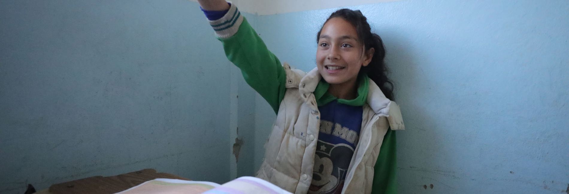 Nour attends a primary public school rehabilitated by UNHCR in Syria.