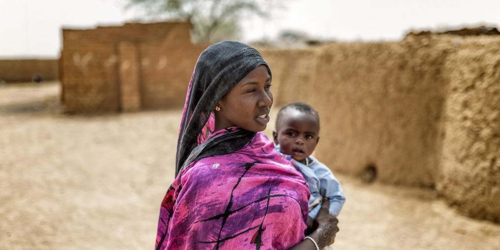 Djawahir, 24, and her 12-month-old baby boy Houssni live in Kounoungou refugee camp, eastern Chad, March 2021.