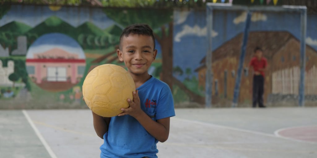 A child plays at a community youth centre for at-risk and displaced families supported by UNHCR in San Pedro Sula, Honduras. By the end of 2018, over 17,500 unaccompanied children had fled from horrific violence across Northern Central America. 